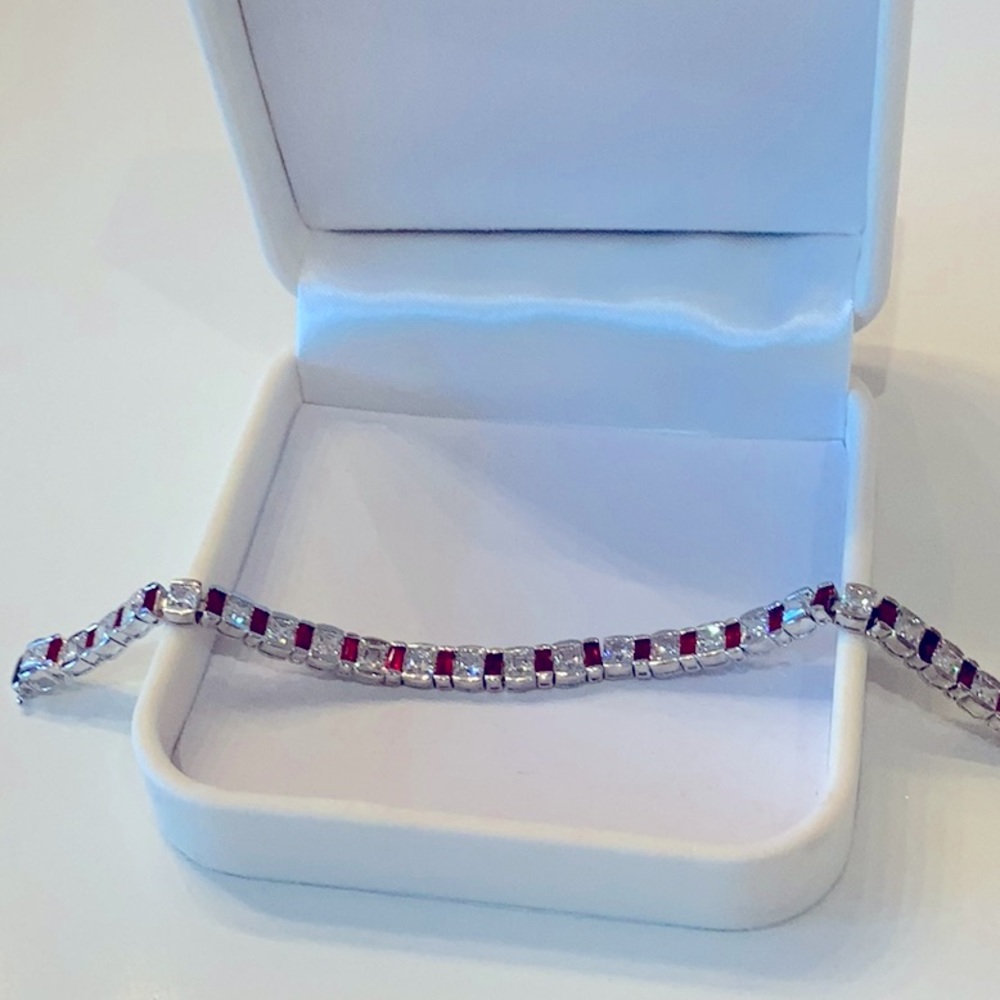 Beautiful CZ and simulated Ruby tennis bracelet.